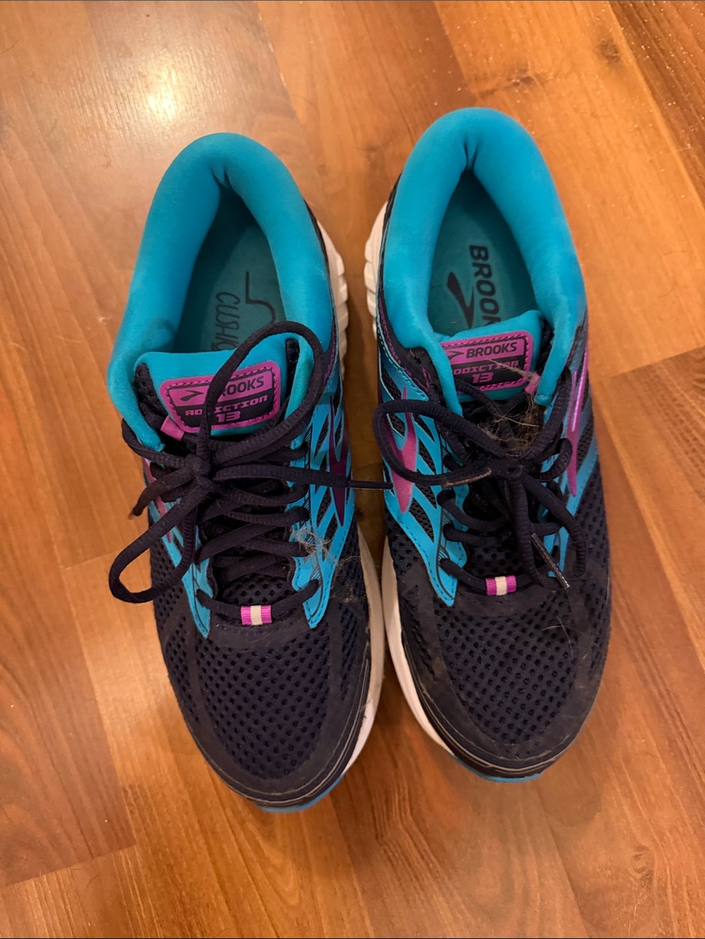 Brooks Women's Navy, Teal, and Purple Running Shoes. Size 10.5